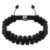 Czarna bransoletka z koralikami na sznurku makramowym.