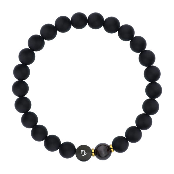 Czarna bransoletka z koralików z symbolem Koziorożca.