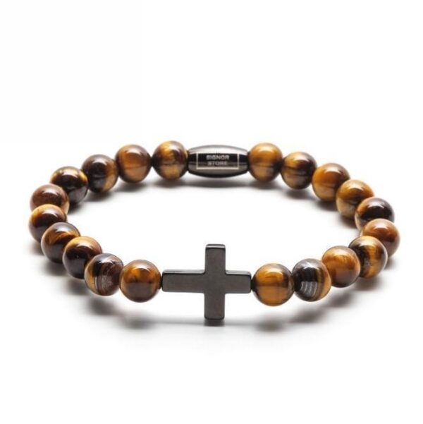 Bransoletka z koralikami z tygrysiego oka i krzyżem.