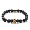 Bransoletka z czarnych koralików z motywem czaszki