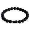 Czarna bransoletka z kamieniami na elastycznej żyłce.