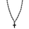 Naszyjnik z metalowymi kulkami i czarnym krzyżykiem.